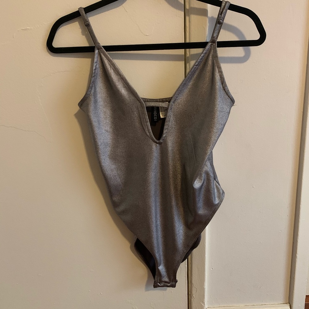 Silver body suit